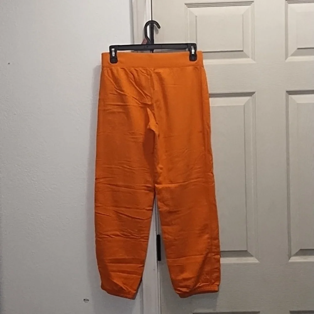 Justice Orange Sweatpants with Text Graphics